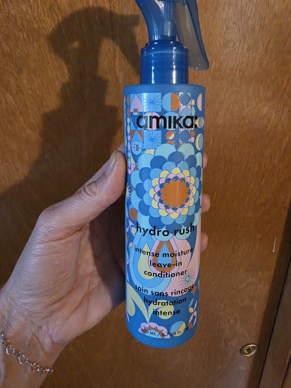 amika Hydro Rush Intense Moisture Leave-In Conditioner - Blue & Orange
